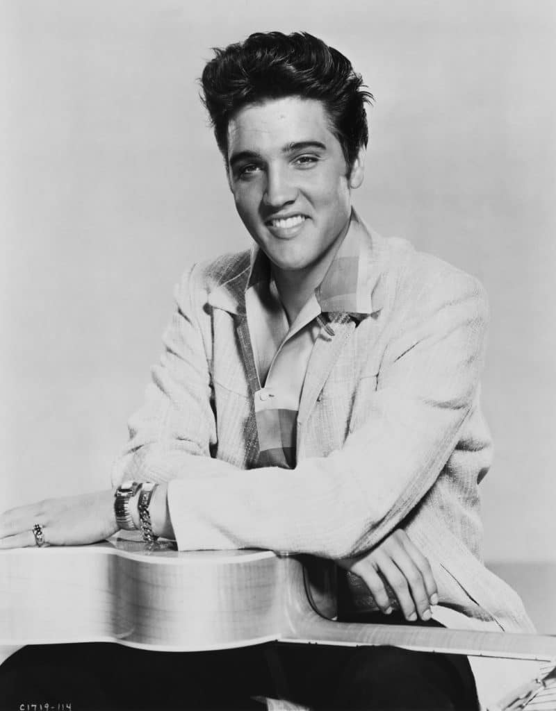 Learn some facts about Elvis Presley, pictured here in 1955.