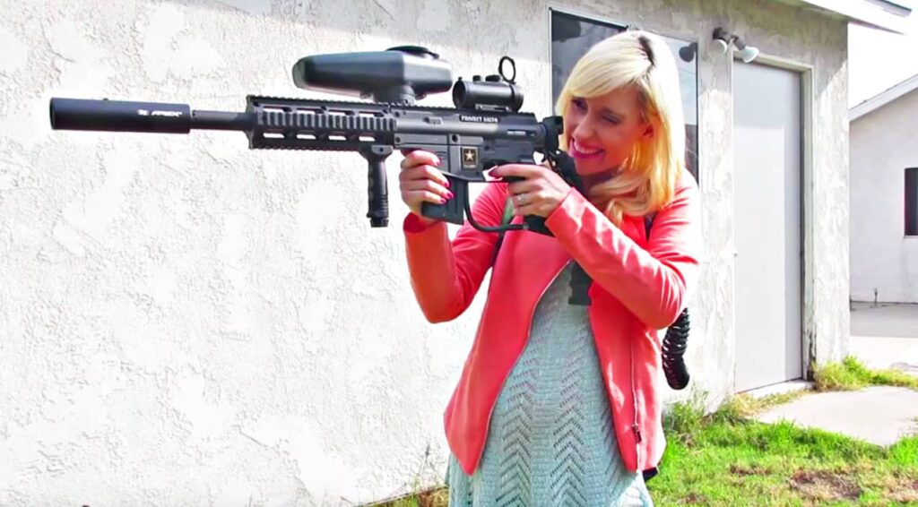 Pregnant Wife Shoots Paintball Gun At Husband In Gender Reveal
