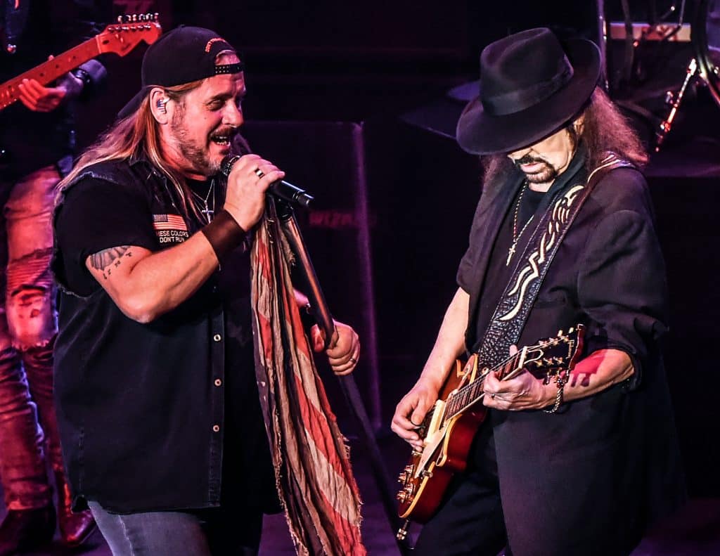 Lynyrd Skynyrd lead vocalist Johnny Van Zant performs next to guitarist Gary Rossington, who died in 2023.