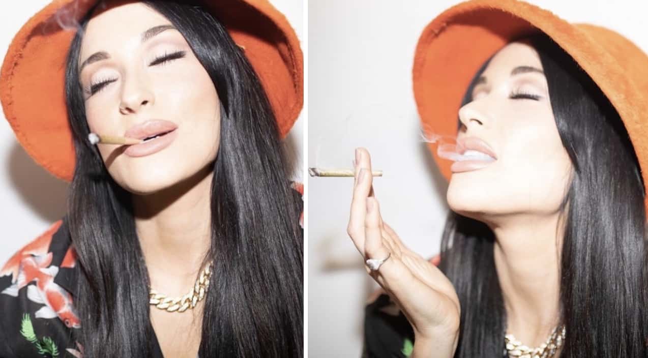Kacey Musgraves smoking a cigarette (or weed)
