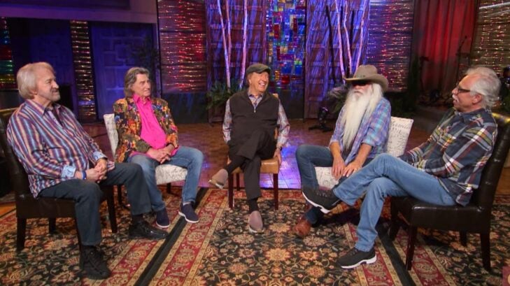 Photo of The Oak Ridge Boys having a discussion.
