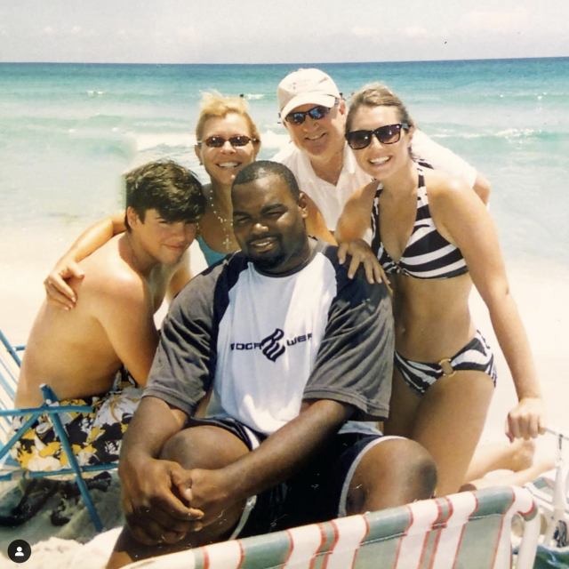 The Tuohy family with Michael Oher.