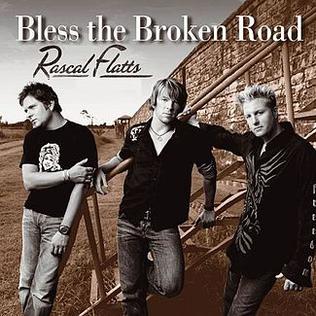 The cover art for the Rascal Flatts version of "Bless the Broken Road"