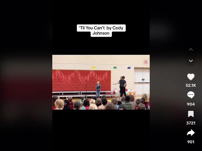 A screenshot showcasing the TikTok video of a first grader covering "'Til You Can't" by Cody Johnson