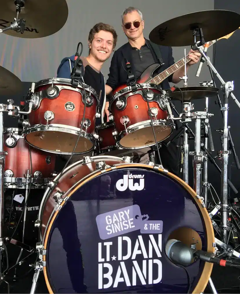 Gary Sinise photographed with his son Mac in his Lt. Dan Band