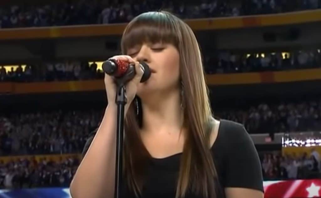 Kelly Clarkson performing the national anthem