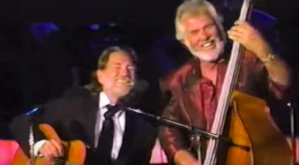 Willie Nelson performs with Kenny Rogers