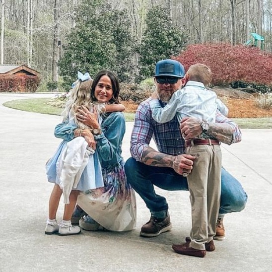 Brantley and Amber Gilbert with their two oldest children, they just welcomed a new baby