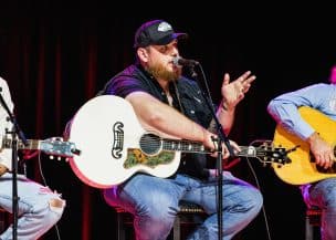 Luke Combs performs onstage for a songwriter round at Country Music Hall of Fame and Museum