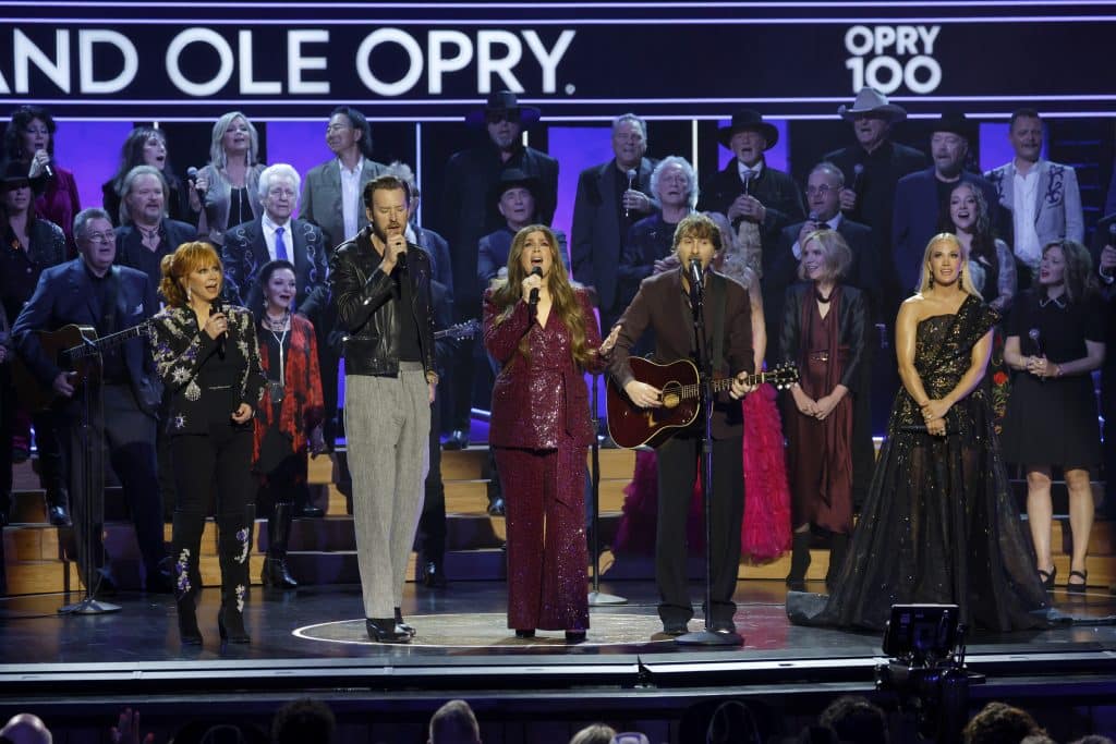 Reba McEntire, Charles Kelley, Hillary Scott and Dave Haywood of Lady A, and Carrie Underwood perform onstage during Opry 100