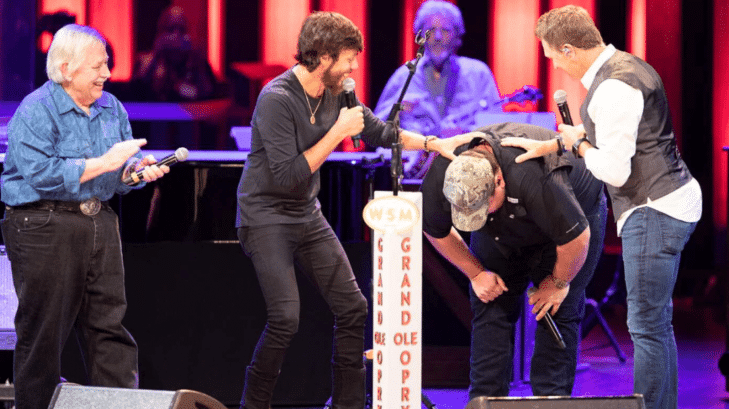 Luke Combs cries while being invited as a member of the Opry
