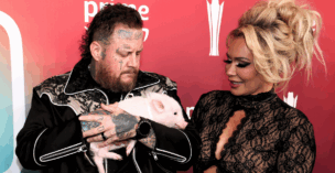 Jelly Roll and his wife, Bunnie XO, hold a pig that Jessie Murph brought to the ACM Awards.
