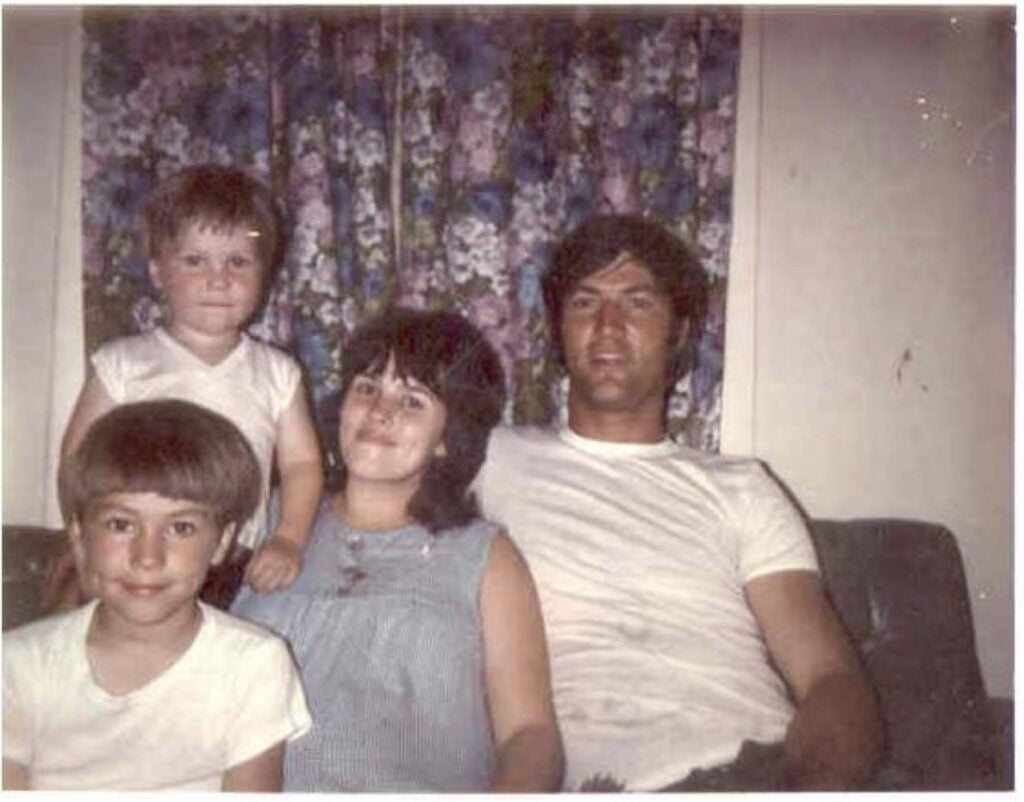 Young Phil and Kay Robertson with two of their sons