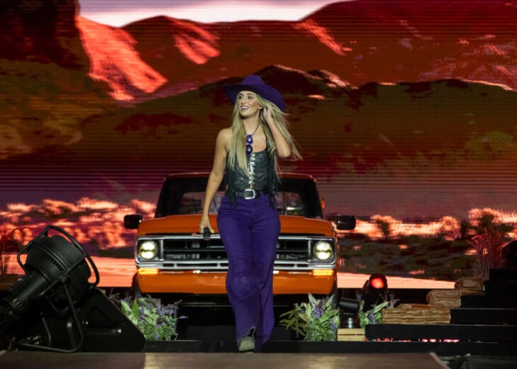 Lainey Wilson performs on stage