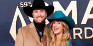 Lainey Wilson and her fiancé Duck Hodges at the CMA Awards in 2025