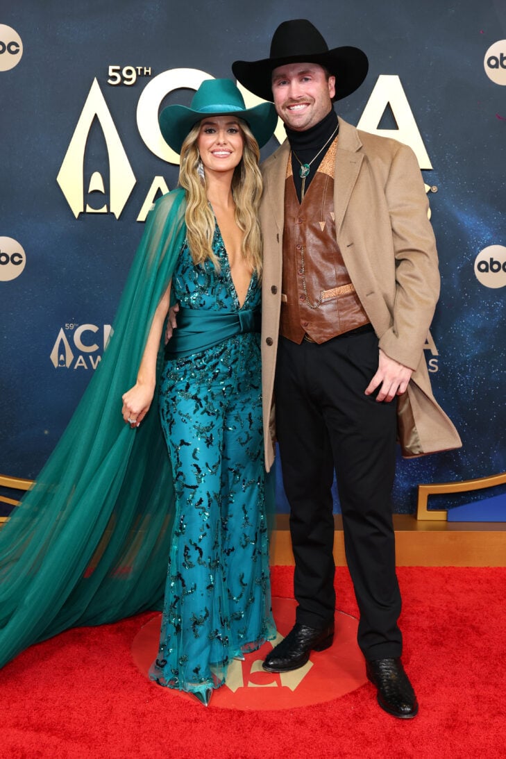 Lainey Wilson and her fiancé Devlin Duck Hodges on the CMA Awards red carpet