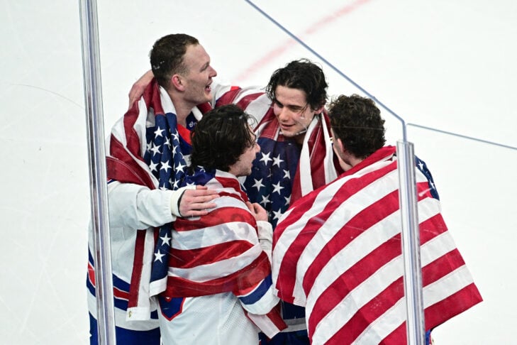 Team USA celebrates after winning gold at the olympics for men's ice hockey