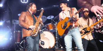 With an accompanying saxophone, country artist Zach Top has creatively reimagined a song popularized by Conway Twitty, "Slow Hand."