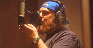 Luke Combs performs his new song "I Ain't No Cowboy" in the studio